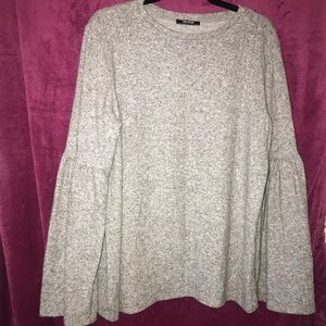 Soft sweater with bell sleeve